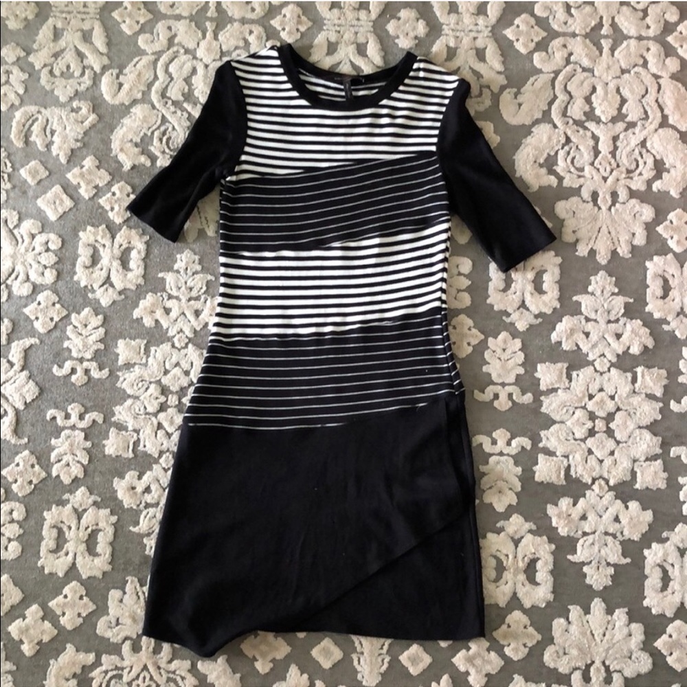 BCBG form fitting dress.